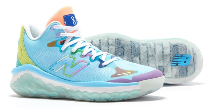 View of blue and white New Balance shoes.